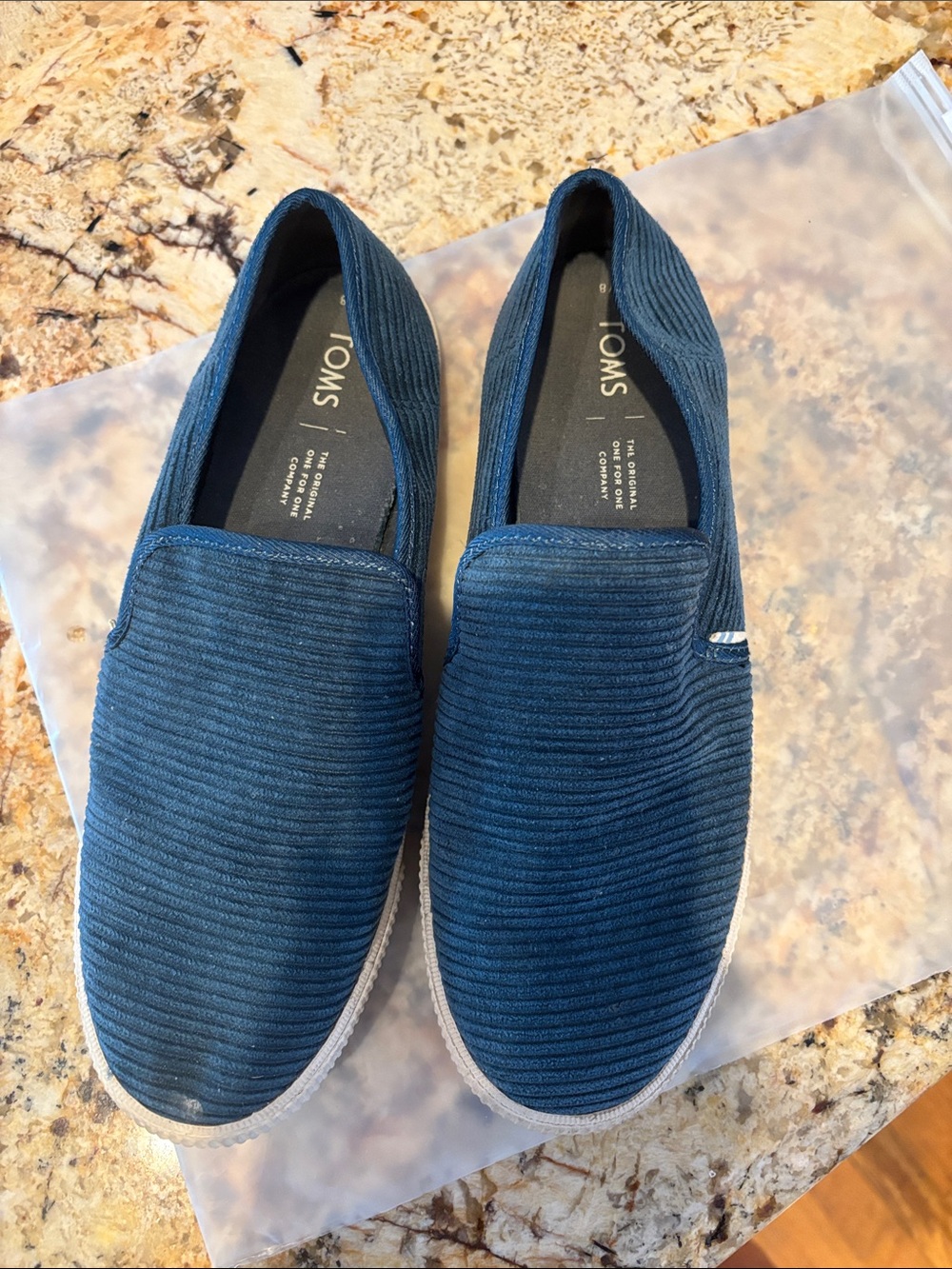 Tom’s dark royal blue slip ons